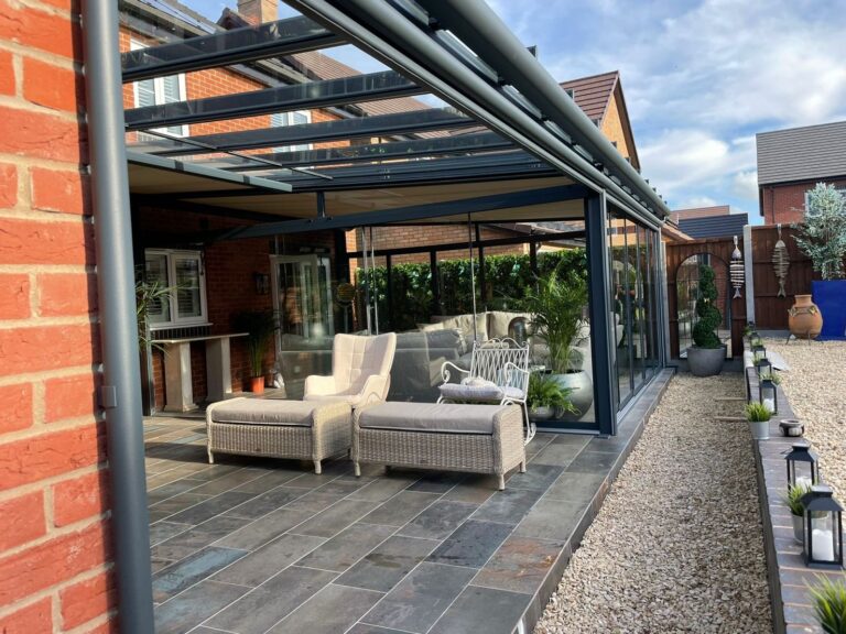 large pergola with glazed door and glass roof