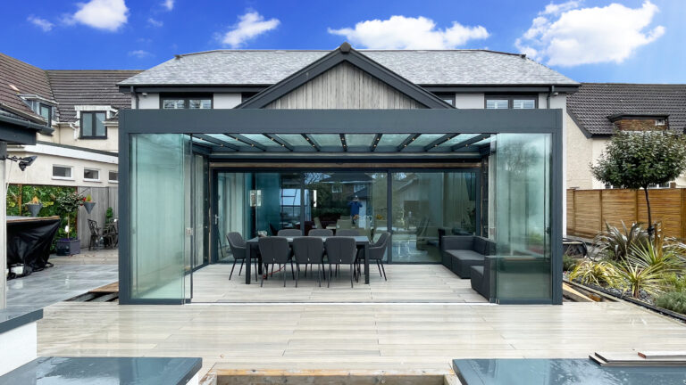 large vue pod with glass roof and dining area