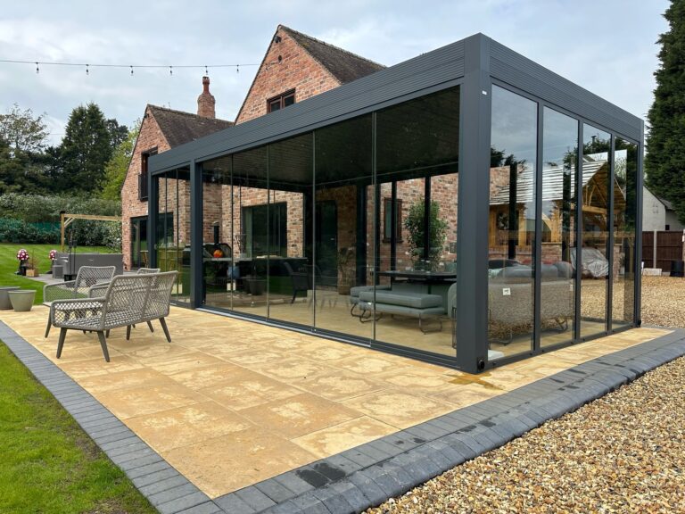 large anthracite pergola in a beautiful villa patio