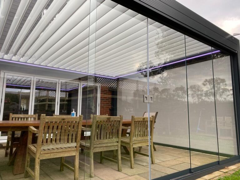 bladed roof pergola with screens and shading