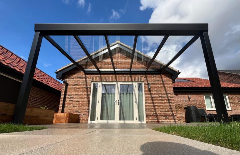 glass roof ambient pergola in black