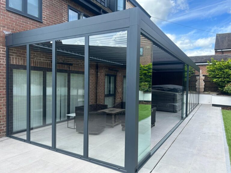 large bladed roof pergola with glazing in anthracite