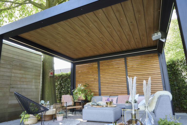 large pergola with wooden door and ceiling with decorative lighting