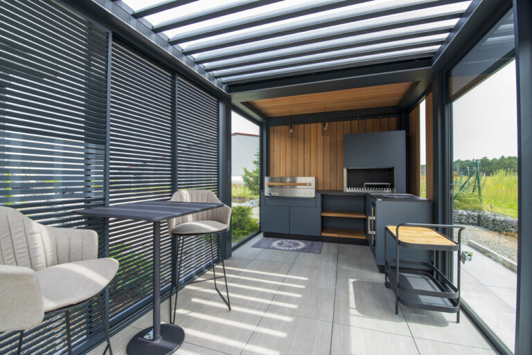 pergola with shading and kitchen and grill area